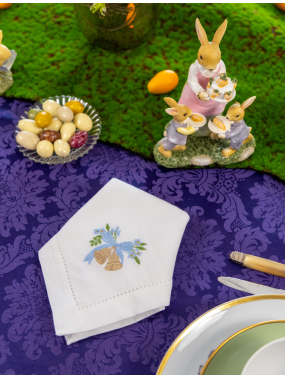 Easter napkin, machine-embroidered with an open hem.