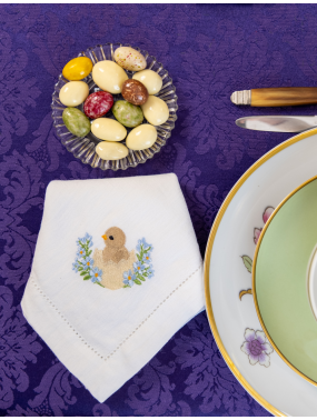 Easter napkin, machine-embroidered with an open hem.