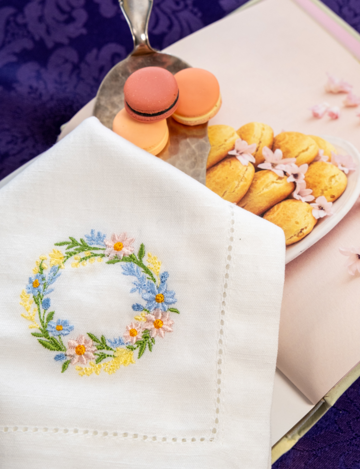 Easter napkin, machine-embroidered with an open hem.